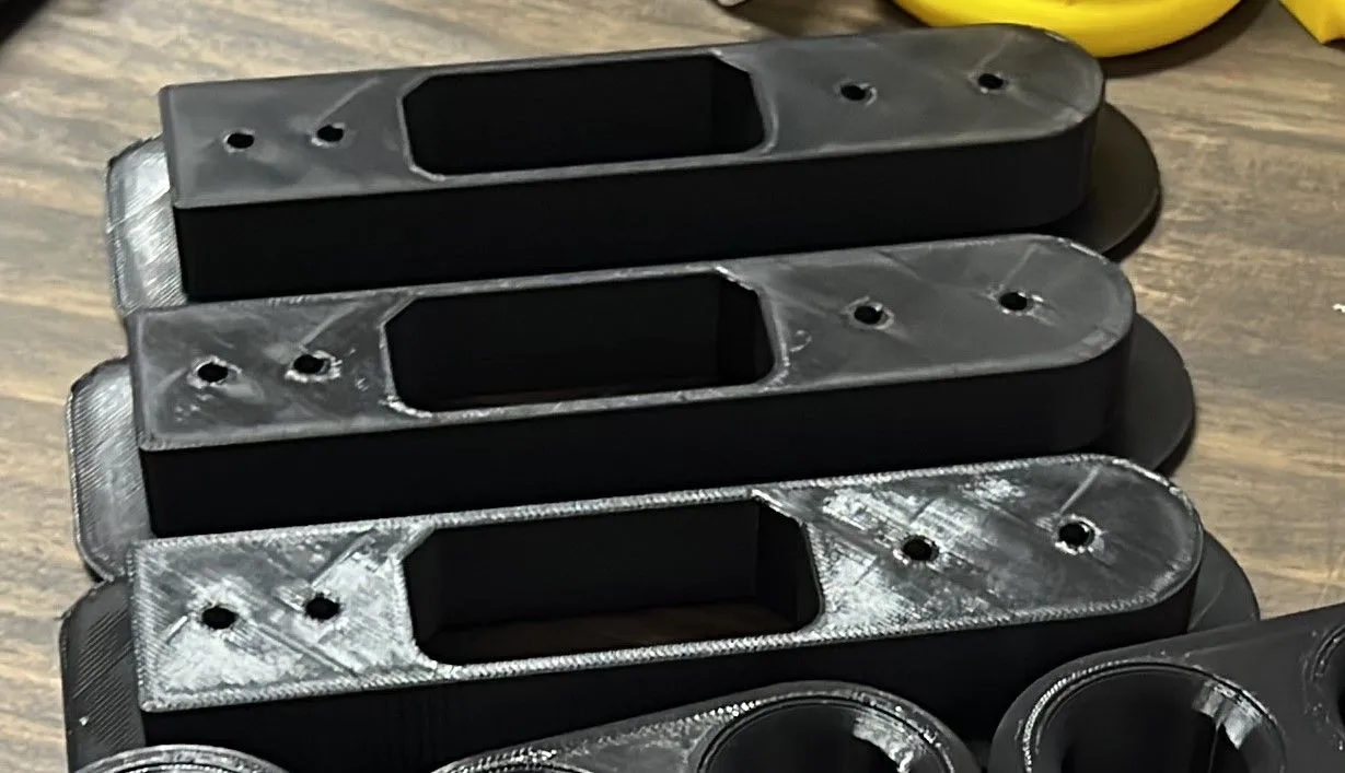 How do you put metal threads or magnets in a 3D print?