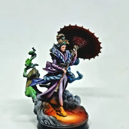 A painted fantasy miniature in a purple robe with a parasol, on a cloud base