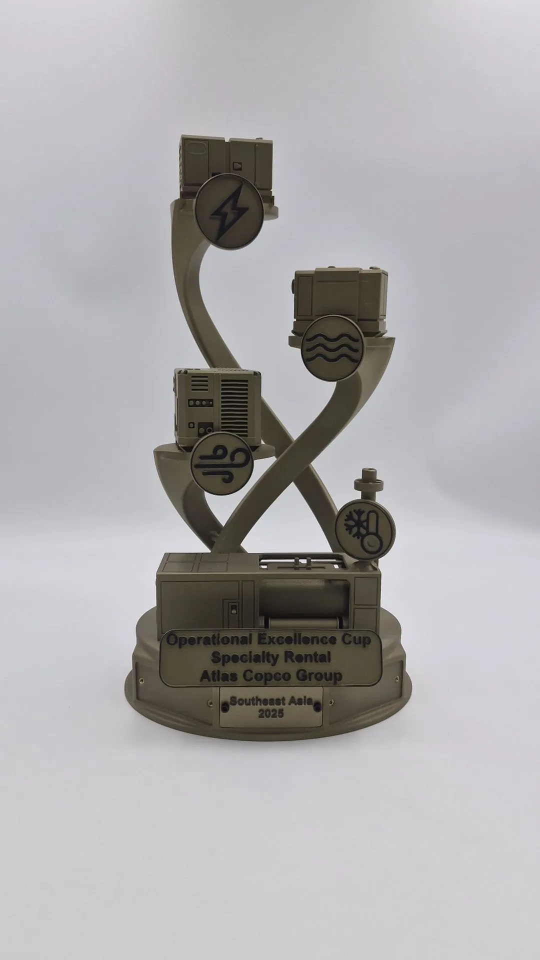 One finished gold Operational Excellence Cup trophy from the front, on a white background