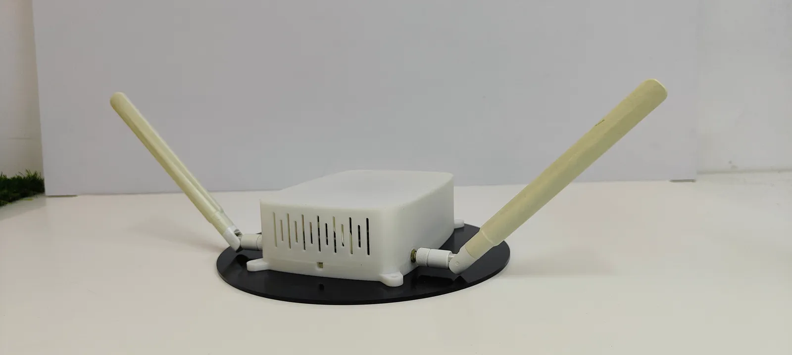 The case front on with its two antennas folded out wide to either side