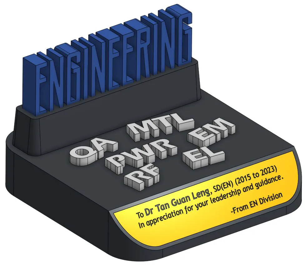 Revision 1 render: ENGINEERING in blue on a raised black back, the abbreviations QA, MTL, PWR, EM, RF and EL in neat rows and a gold plate in front