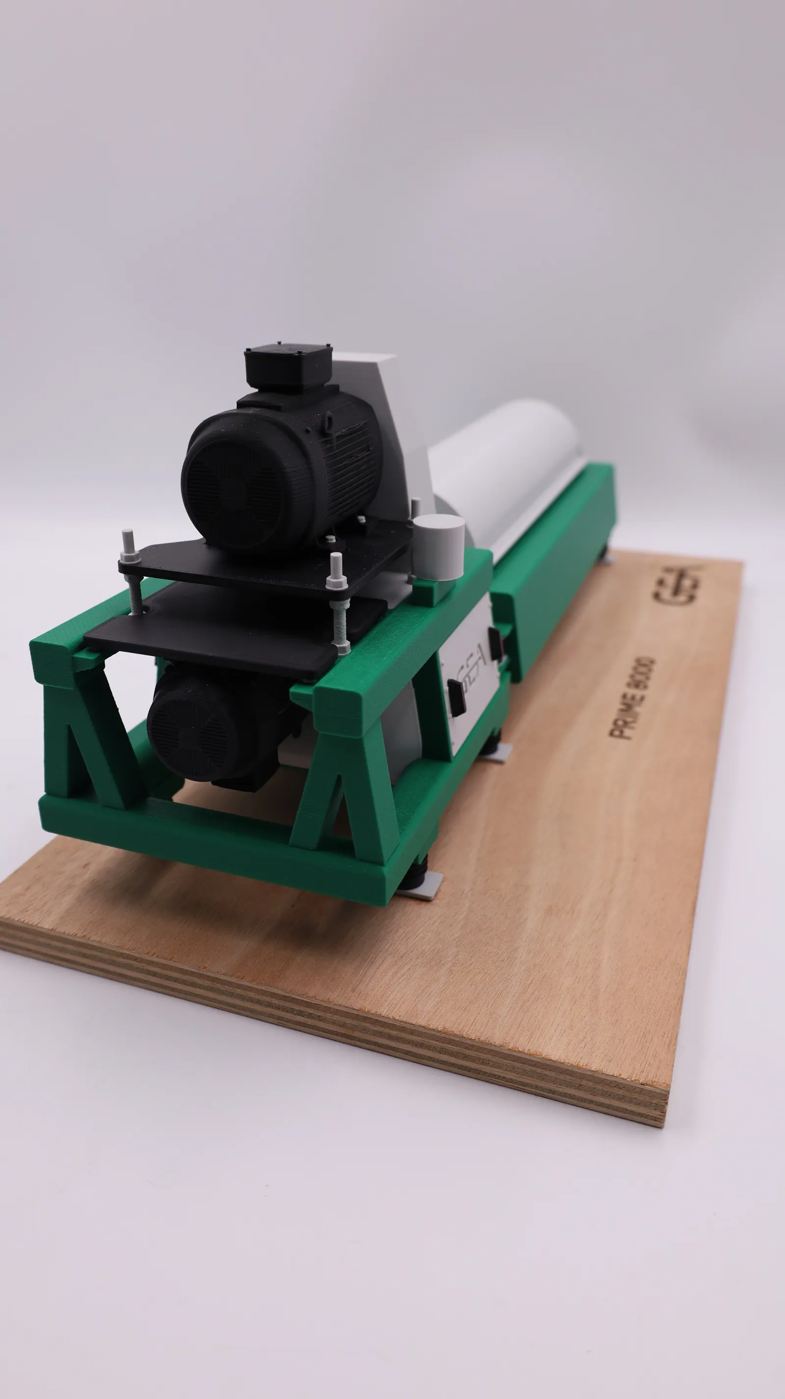 The motor end of the model: black drive motors on their mounting plates, threaded rods and the green A-frame stand