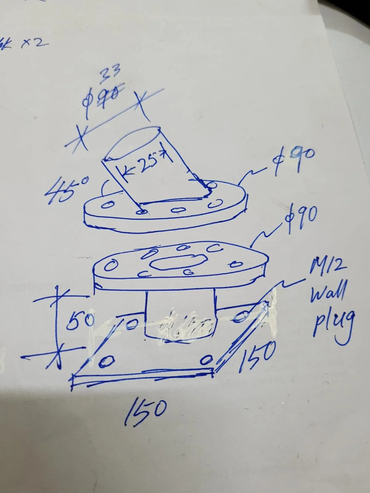 Hand sketch of the wall bracket: an angled tube on a round plate, bolted to a 150 mm square base with M12 wall plugs
