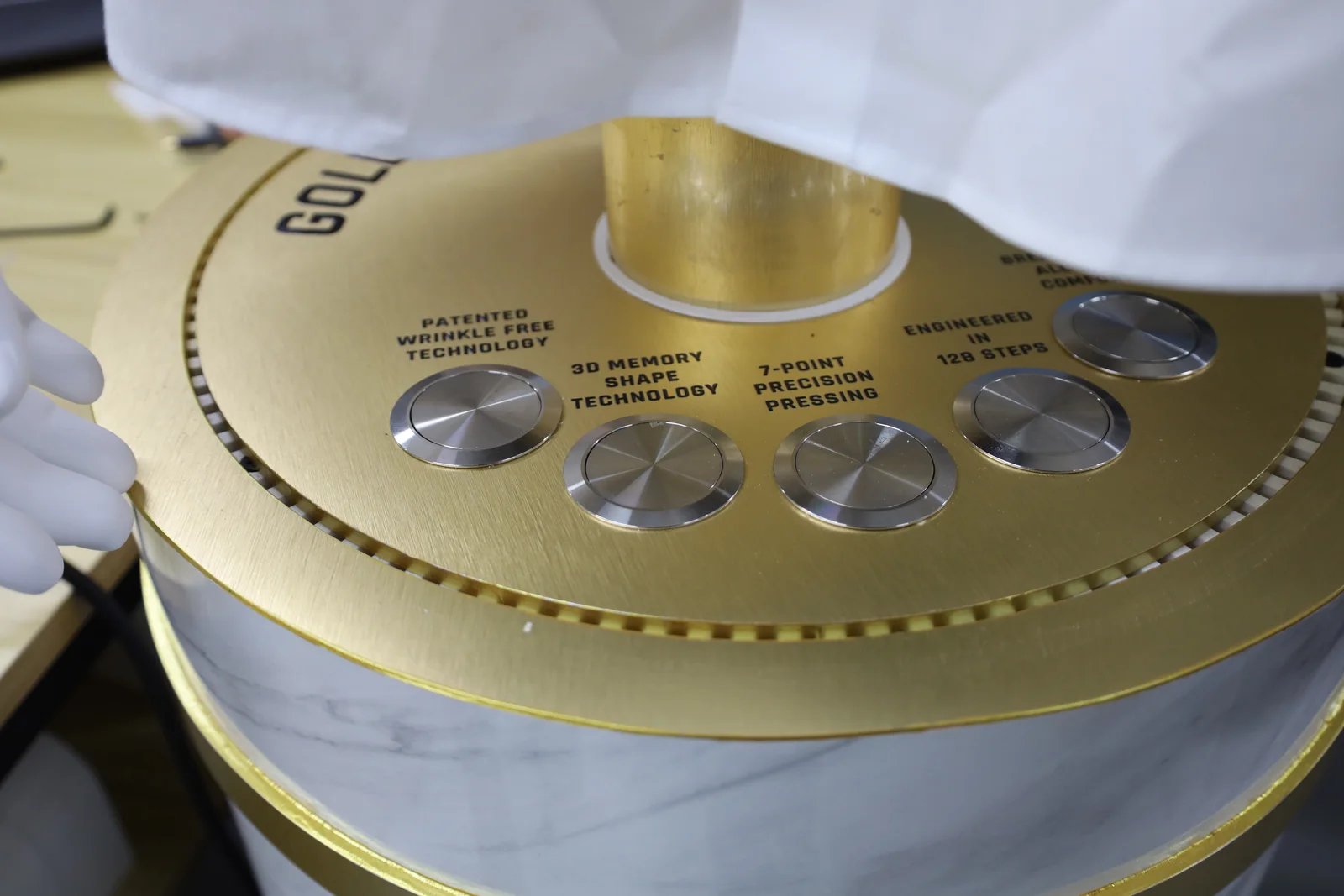 Goldlion Interactive Shirt Display — Cut the brushed-gold turntable plates and UV-printed the campaign graphics