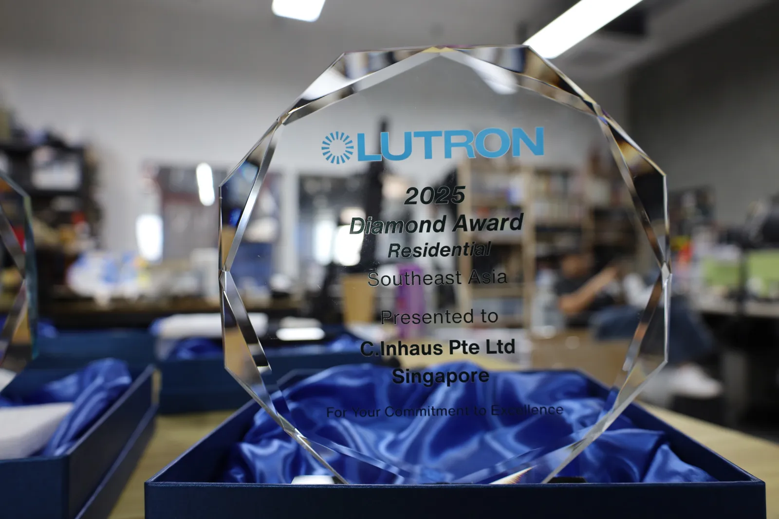 A Lutron 2025 Diamond Award, Residential, Southeast Asia, presented to C.Inhaus Pte Ltd, Singapore, in a satin-lined box