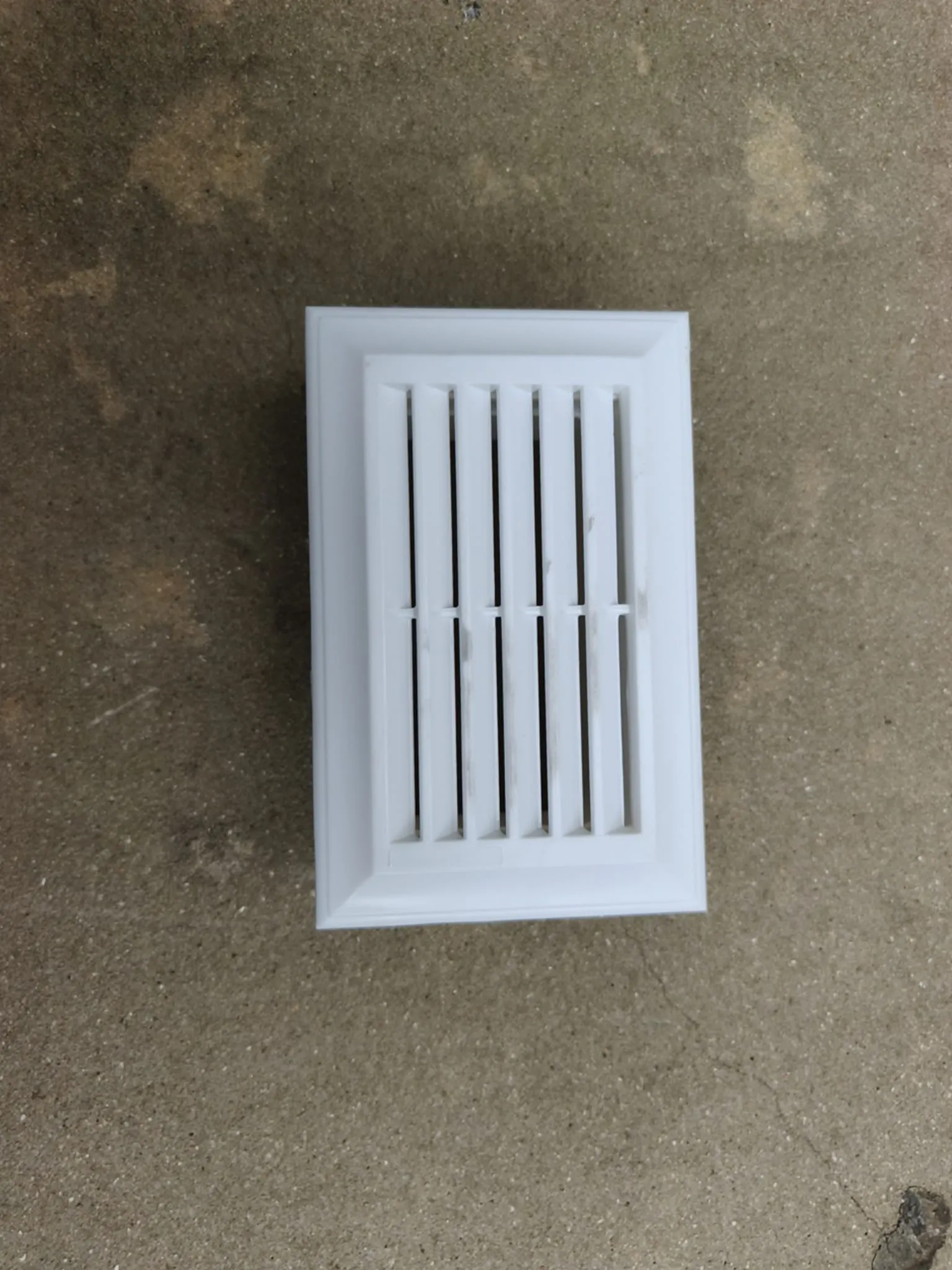 The white louvre sample sent as the reference for the large vent's new straight slats