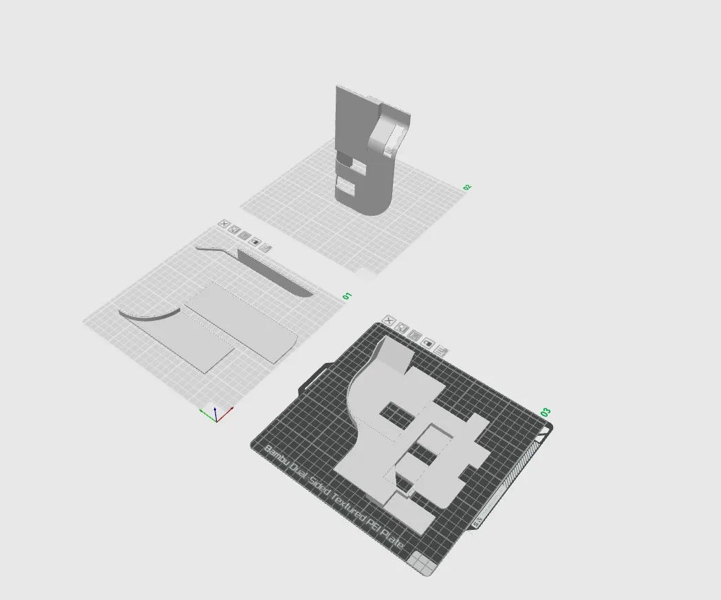 Screenshot of three print plates, each holding a different part of the model: an upright wall, a curved floor plate and a large ground slab