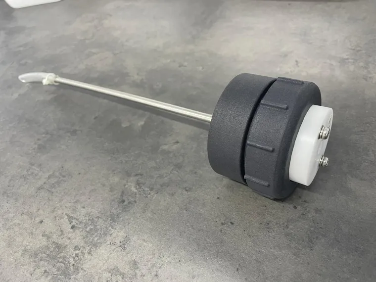 Matte black 3D-printed cap assembly with stainless steel tube