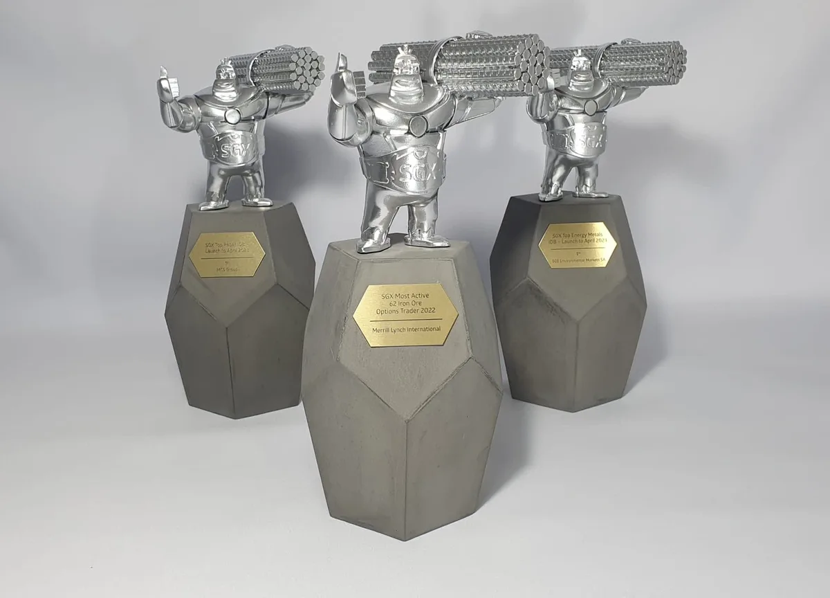 SGX strongman iron-ore trophy set on concrete bases