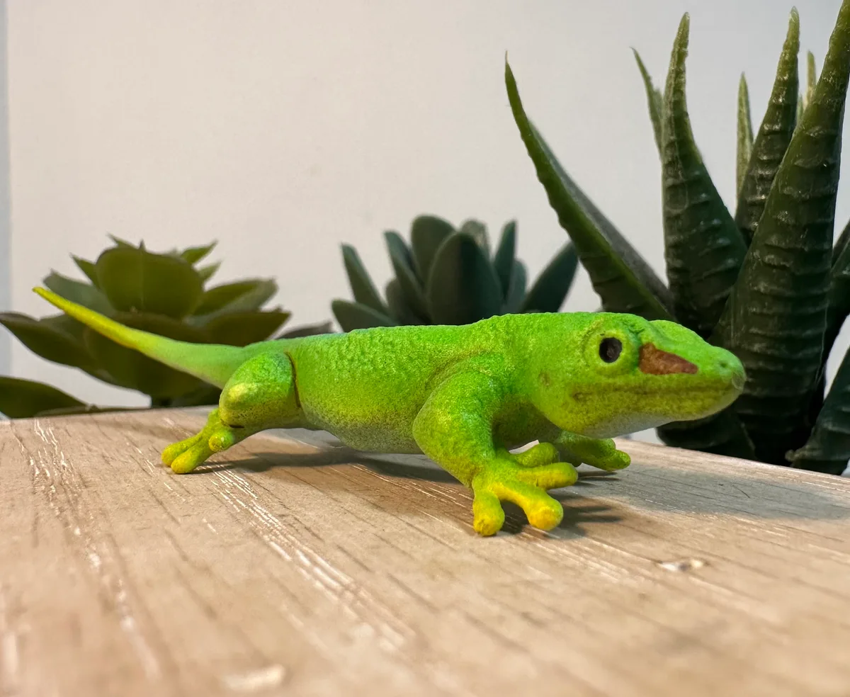 Realistic hand-painted green gecko figurine