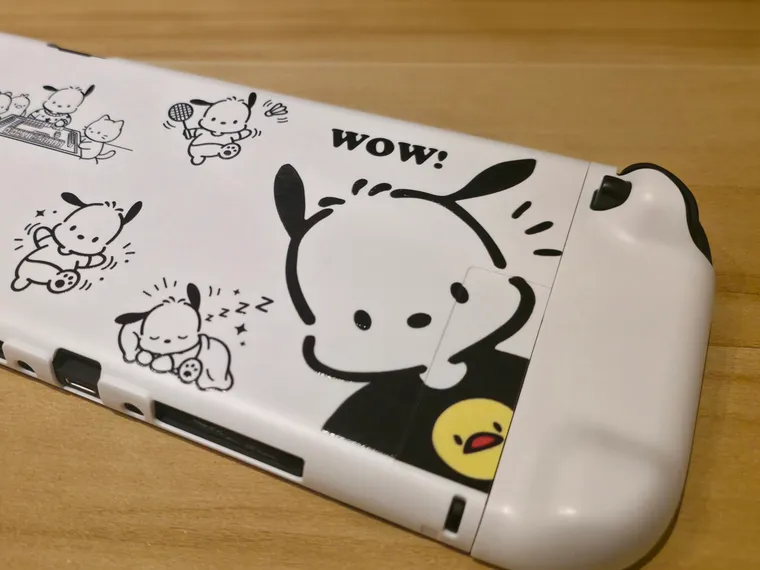 UV-printed character artwork on a game console