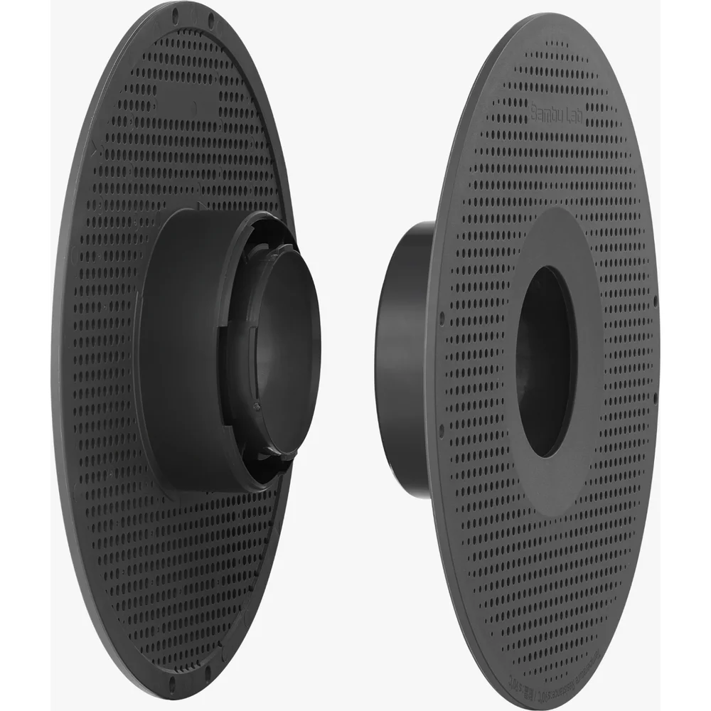 A Bambu reusable spool split into its wide and narrow halves