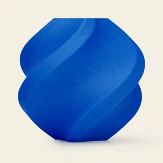 A blue vase 3D printed in ABS-GF filament, with a matte finish