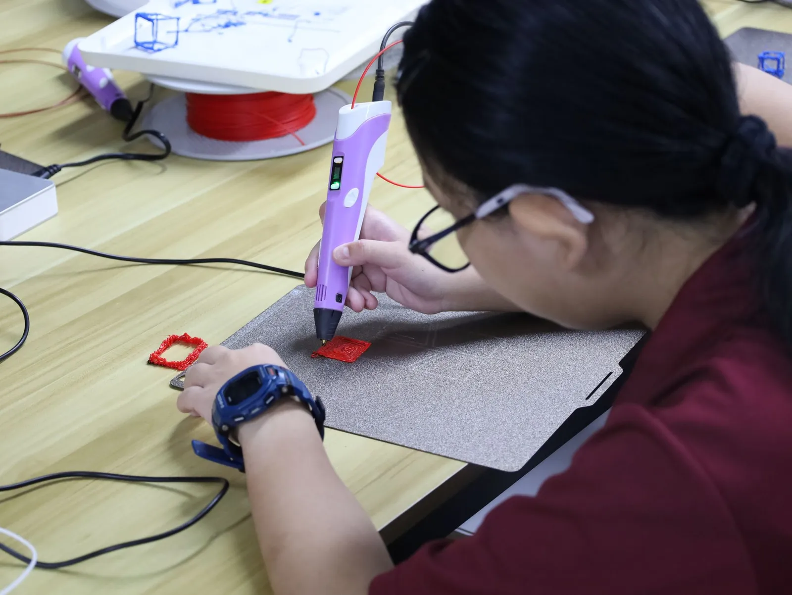 Students at the 3D pen station