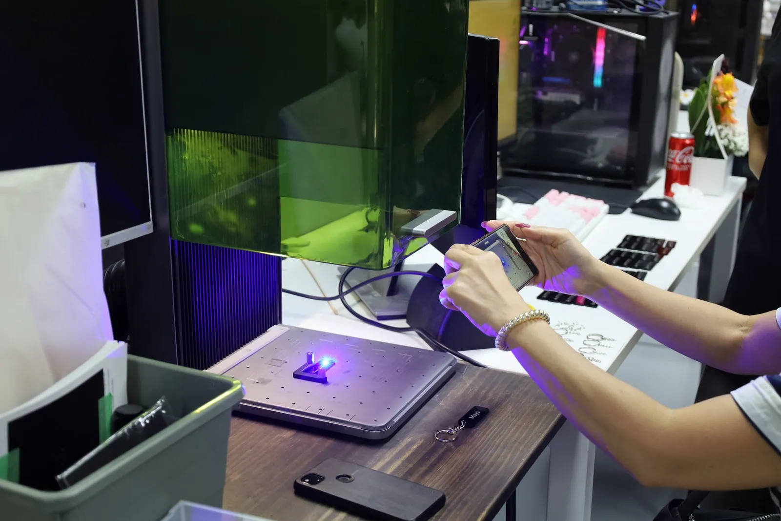 Students at the laser engraving station